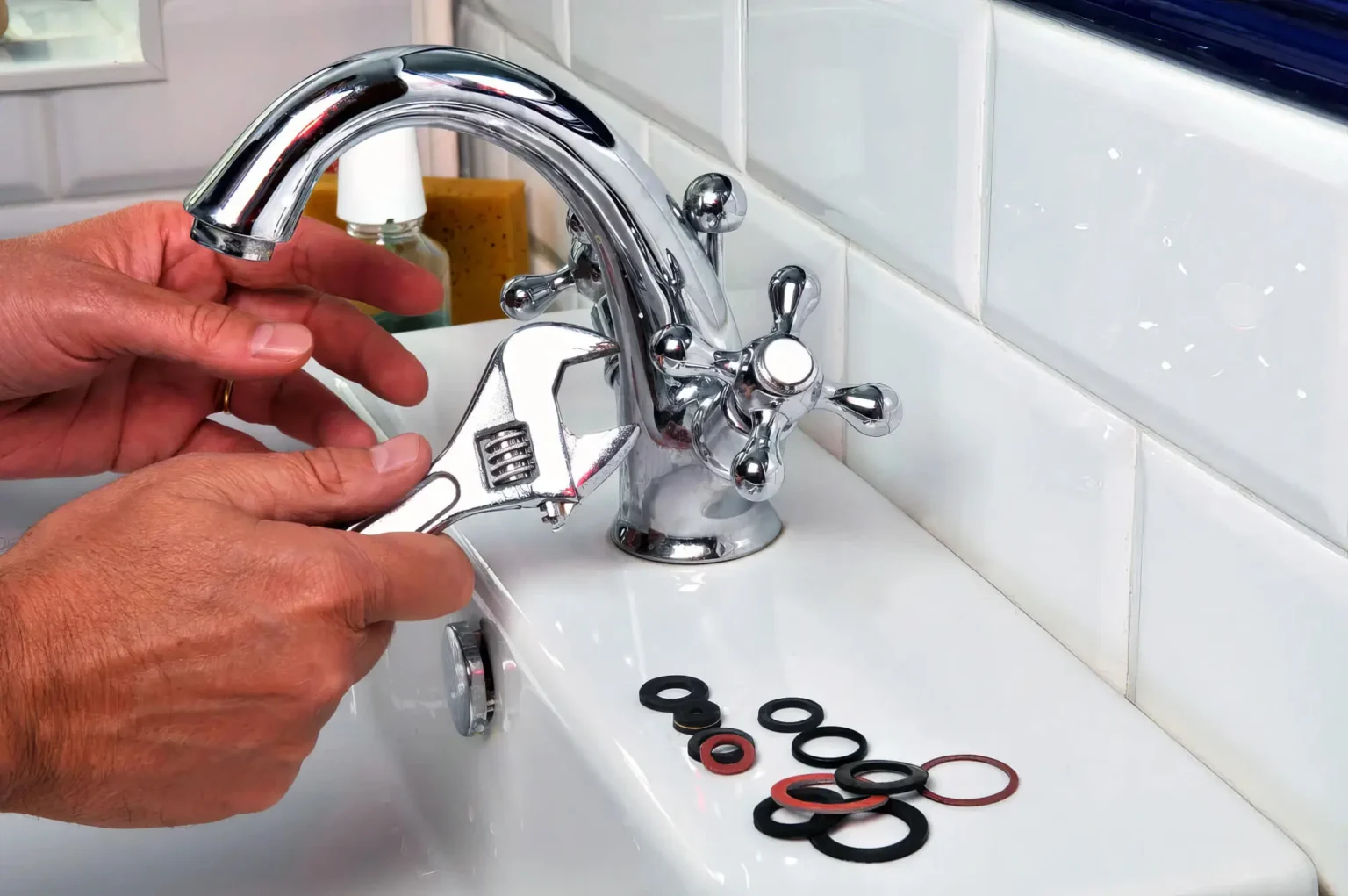 Plumber maintaining a bathroom faucet in Pacifica